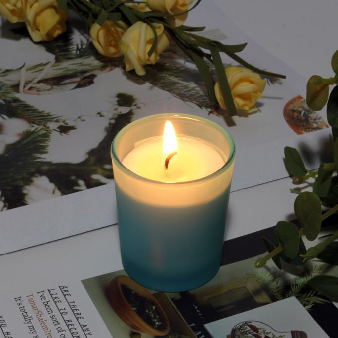 Il vetro durevole che non dà fumo all'ingrosso 35 ore di madre di rilassamento altamente profumata duratura ha sentito la candela profumata degli uomini del barattolo delle candele