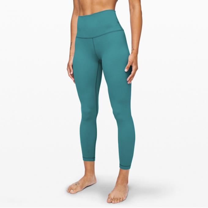 I pantaloni di yoga di forma fisica dell'elastam della mutanda di yoga del bootleg delle donne calde di Saling con vita di allenamento della tasca l'alta sgranocchiano le ghette di estremità