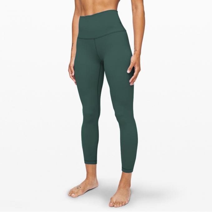 I pantaloni di yoga di forma fisica dell'elastam della mutanda di yoga del bootleg delle donne calde di Saling con vita di allenamento della tasca l'alta sgranocchiano le ghette di estremità