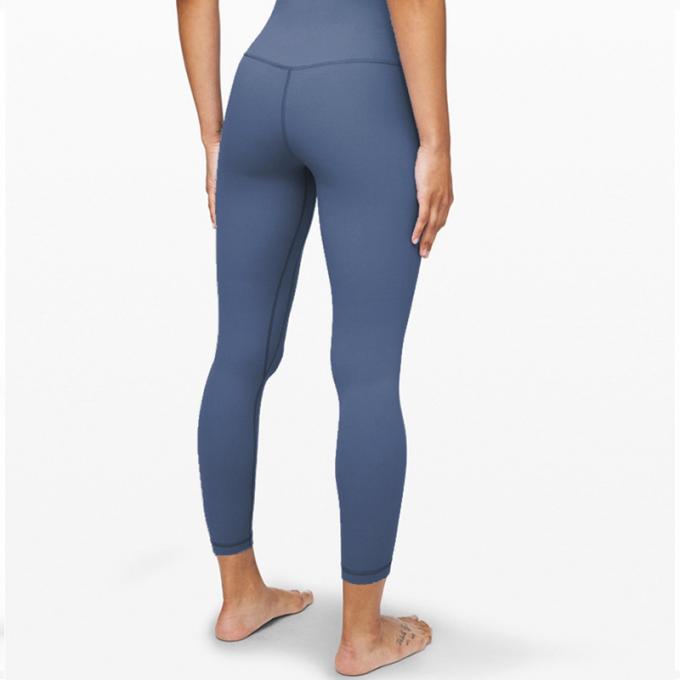I pantaloni di yoga di forma fisica dell'elastam della mutanda di yoga del bootleg delle donne calde di Saling con vita di allenamento della tasca l'alta sgranocchiano le ghette di estremità