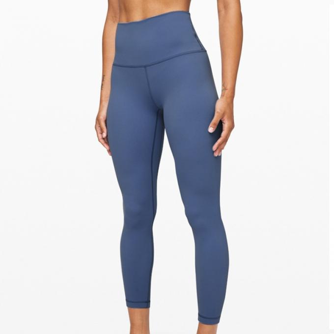 I pantaloni di yoga di forma fisica dell'elastam della mutanda di yoga del bootleg delle donne calde di Saling con vita di allenamento della tasca l'alta sgranocchiano le ghette di estremità