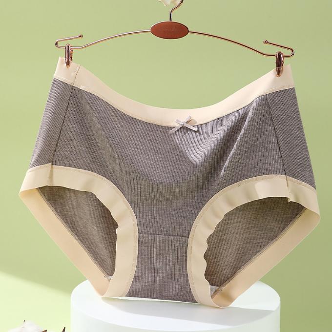 Il cotone medio di Traceless della vita della ragazza all'ingrosso respirabile più la biancheria intima di dimensione 3 strati cola le mutandine delle donne della prova