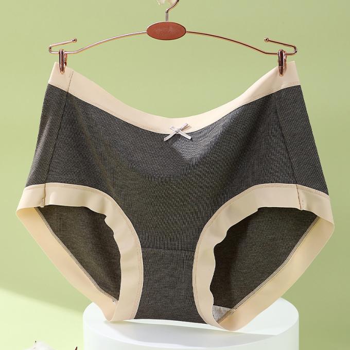 Il cotone medio di Traceless della vita della ragazza all'ingrosso respirabile più la biancheria intima di dimensione 3 strati cola le mutandine delle donne della prova